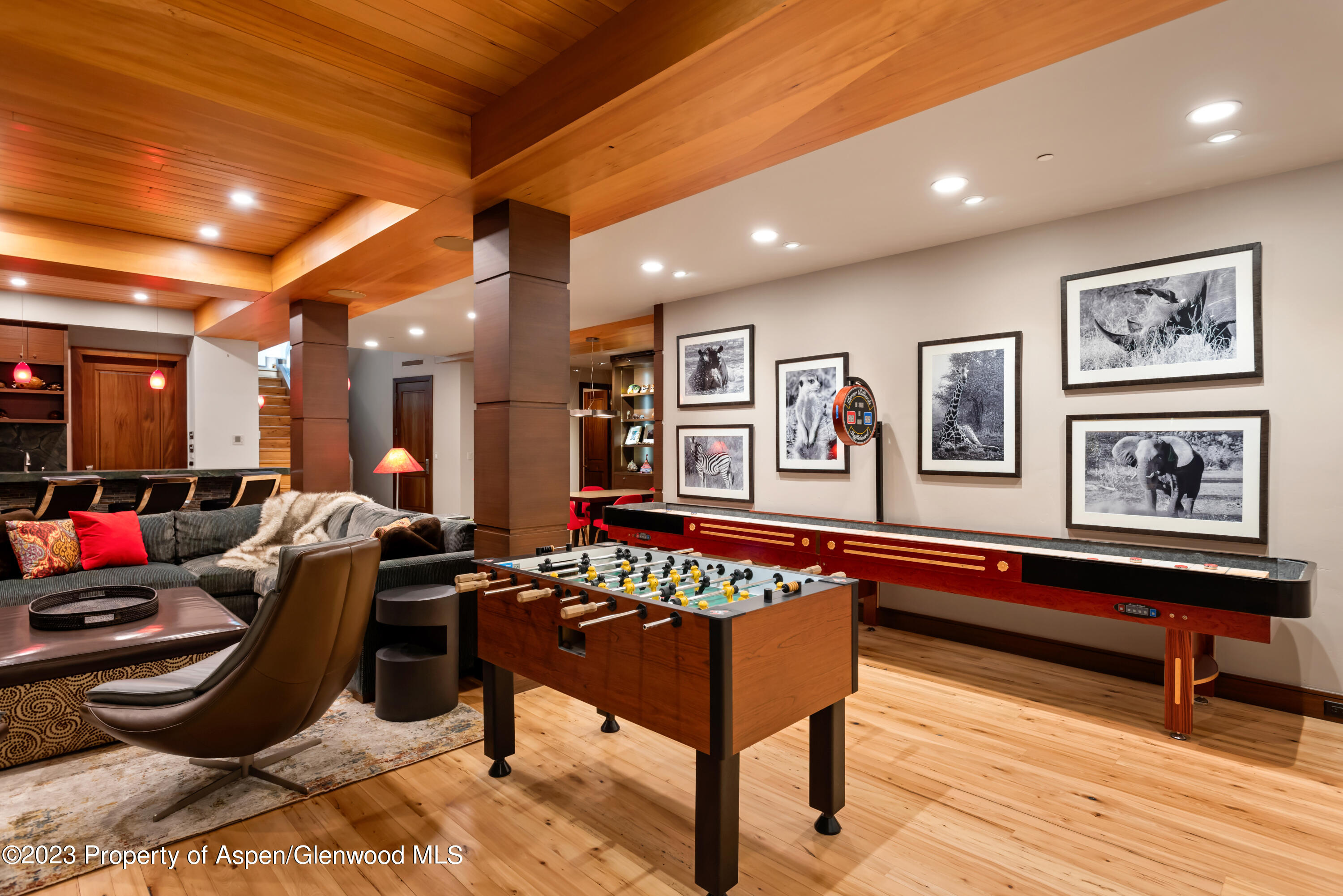 970 Powder Lane Aspen, CO 81611 - Photo 49 of 68 a living room with furniture and a wooden floor