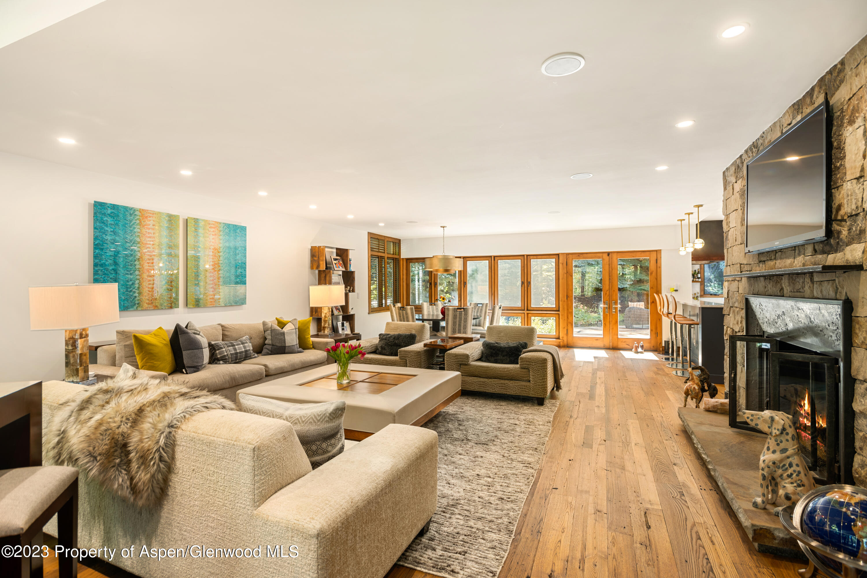 970 Powder Lane Aspen, CO 81611 - Photo 7 of 68 a living room with fireplace furniture and a flat screen tv