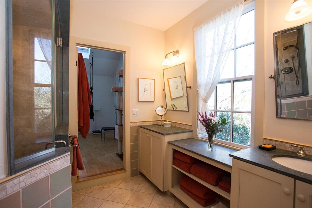 1 Nelson Drive Truro, MA 02666 - Photo 25 of 33 a kitchen with stainless steel appliances a sink stove and a refrigerator