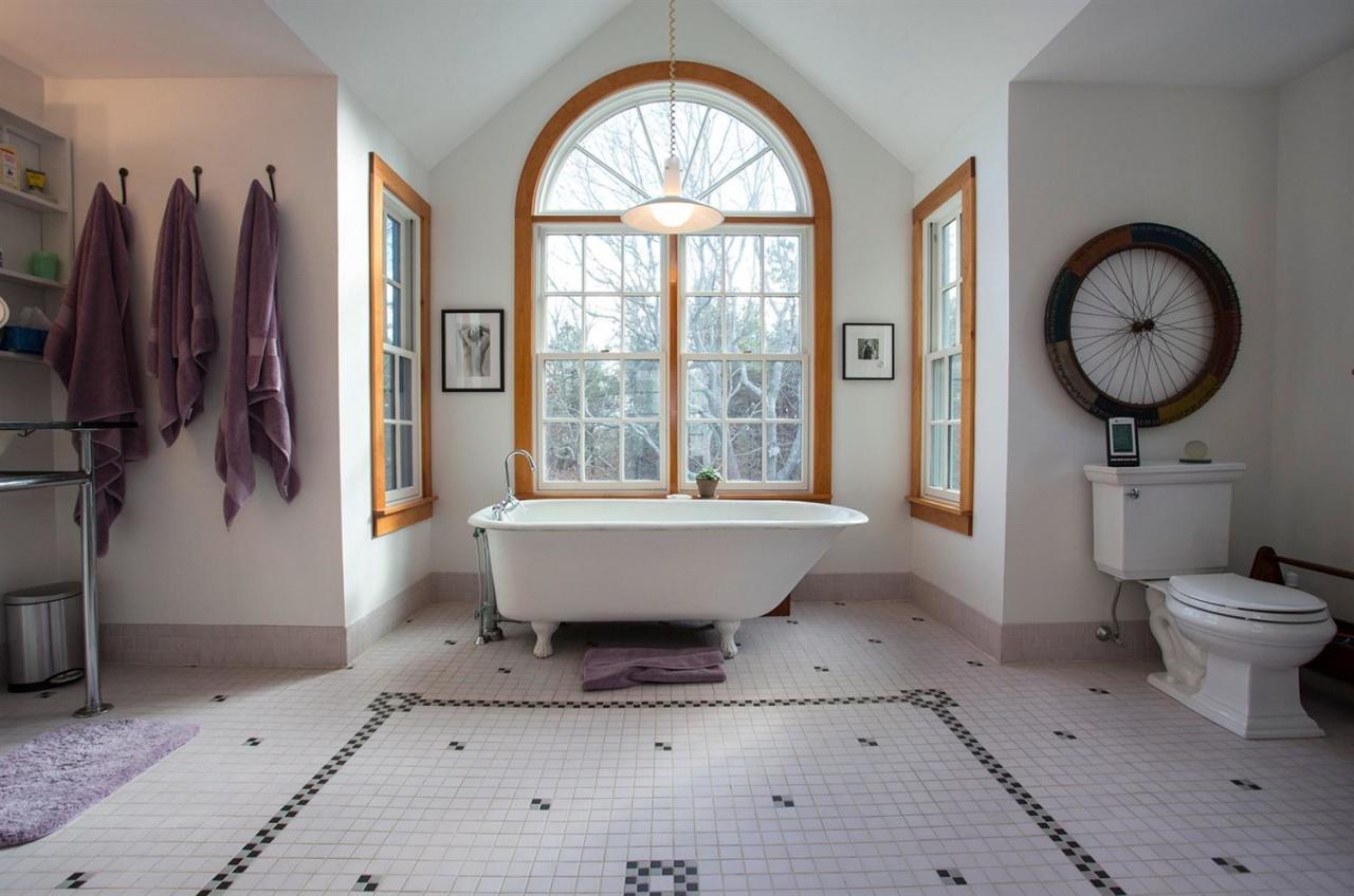 1 Nelson Drive Truro, MA 02666 - Photo 30 of 33 a bathroom with a toilet a sink and a mirror
