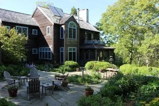 1 Nelson Drive Truro, MA 02666 - Photo 3 of 33 a front view of a house with garden