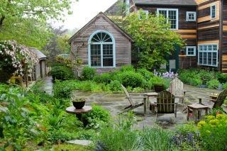 1 Nelson Drive Truro, MA 02666 - Photo 5 of 33 a front view of a house with a yard