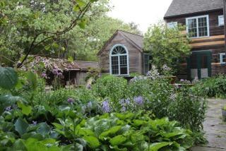 1 Nelson Drive Truro, MA 02666 - Photo 7 of 33 a front view of a house with a yard