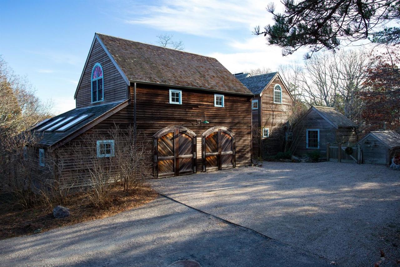 1 Nelson Drive Truro, MA 02666 - Photo 9 of 33 a front view of a house with garage