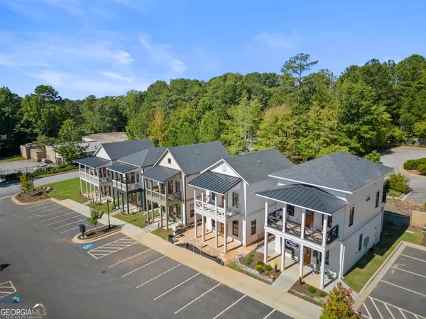 a swimming pool with outdoor seating and yard