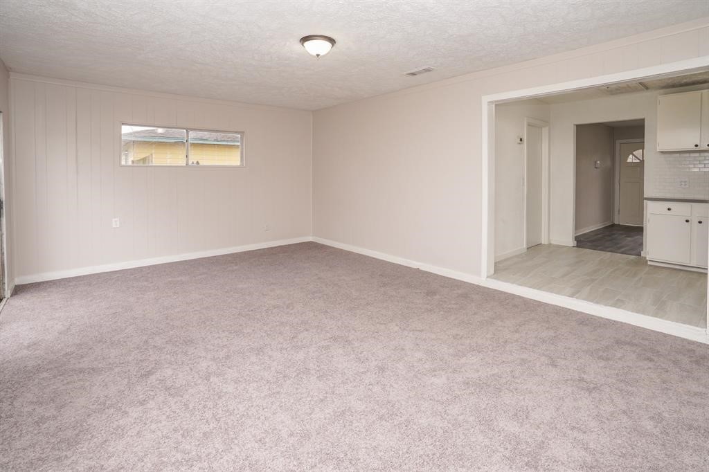 805 Horncastle Street Channelview, TX 77530 - Photo 9 of 12 a view of an empty room with a window