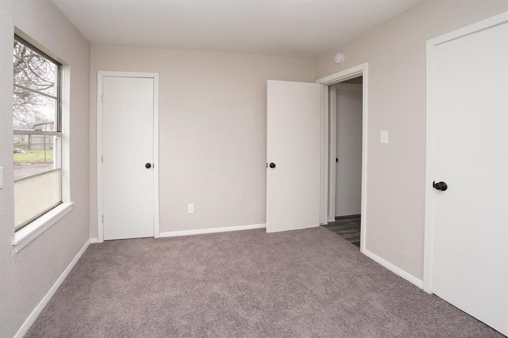 805 Horncastle Street Channelview, TX 77530 - Photo 10 of 12 a view of an empty room with windows and closet