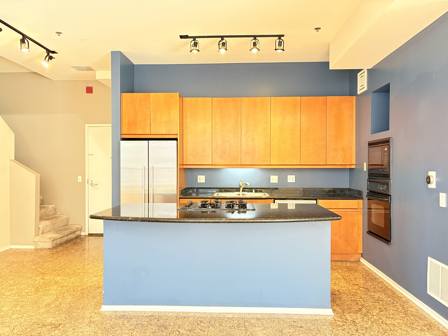 130 South Canal Street, Unit 9M Chicago, IL 60606 - Photo 4 of 14 a view of a swimming pool with a lounge chair