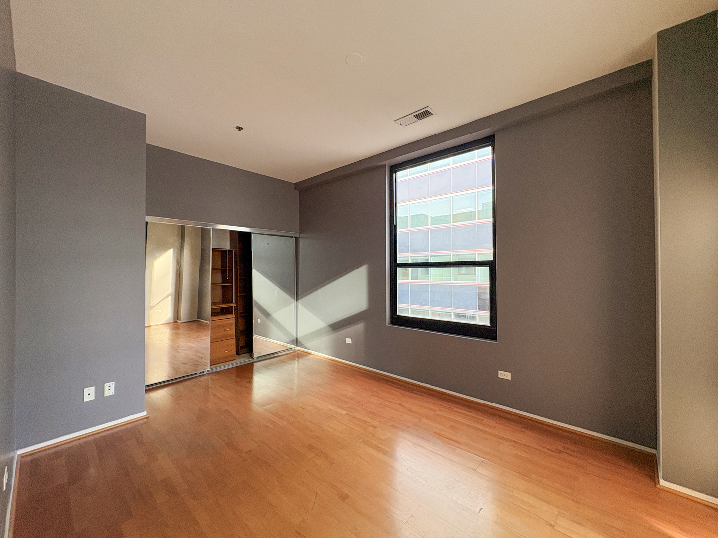 130 South Canal Street, Unit 9M Chicago, IL 60606 - Photo 7 of 14 a view of an empty room with a window