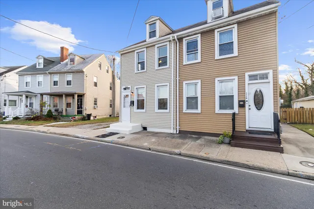 a view of a building with a street