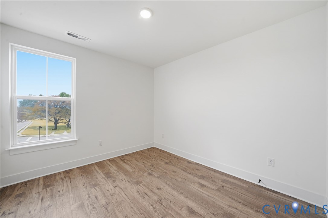 12049 Flowering Lavender Loop Henrico, VA 23233 - Photo 17 of 29 an empty room with a window
