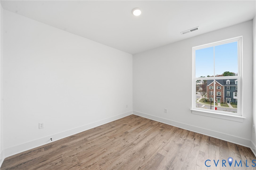 12049 Flowering Lavender Loop Henrico, VA 23233 - Photo 18 of 29 an empty room with a window