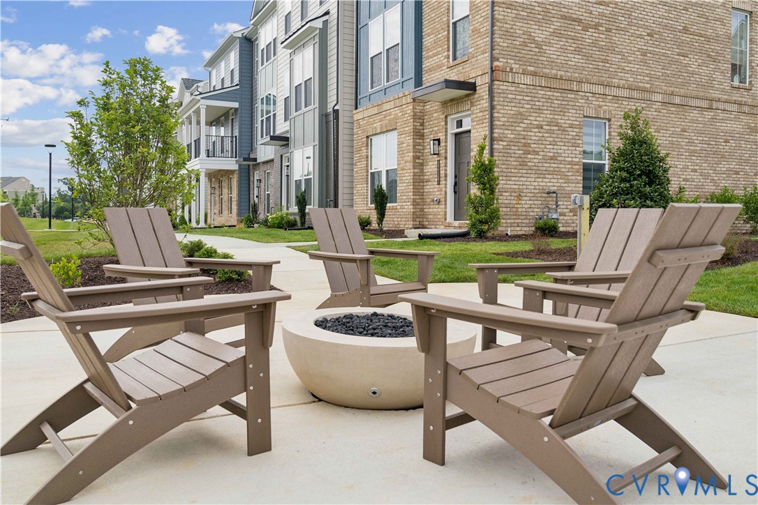 12049 Flowering Lavender Loop Henrico, VA 23233 - Photo 27 of 29 a view of backyard with outdoor seating ad green space