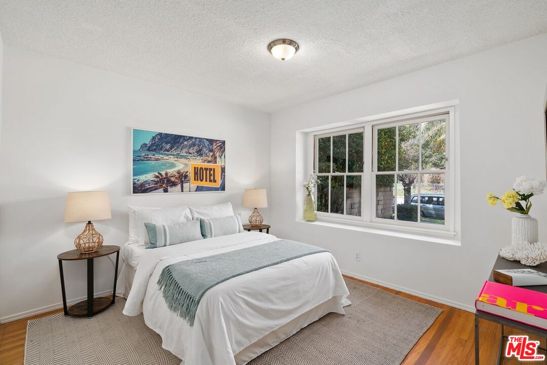 1012 Rose Avenue Venice, CA 90291 - Photo 14 of 27 a bedroom with a bed and a window