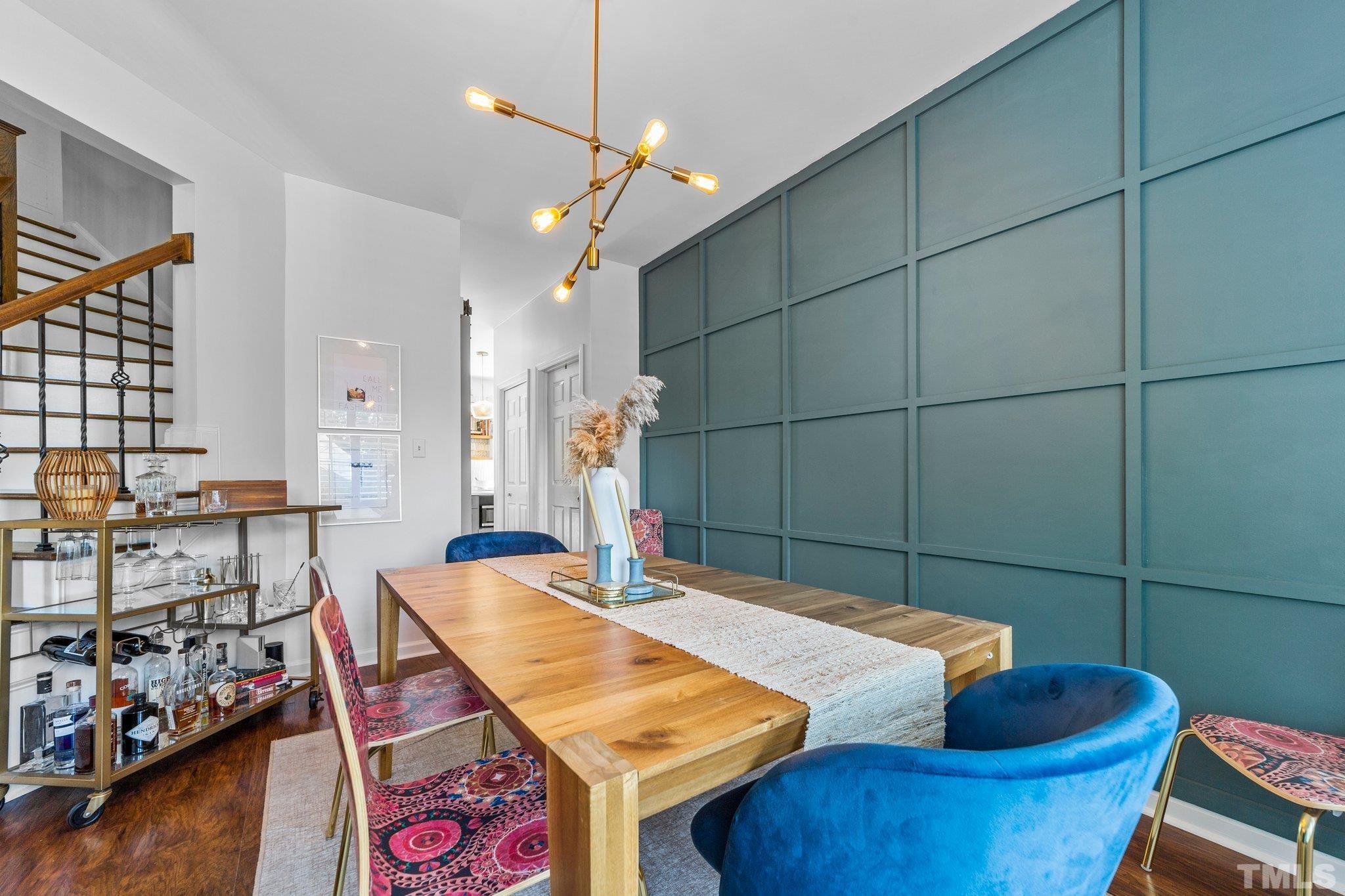 5216 Halcott Court Raleigh, NC 27613 - Photo 3 of 22 a dining room with furniture and wooden floor