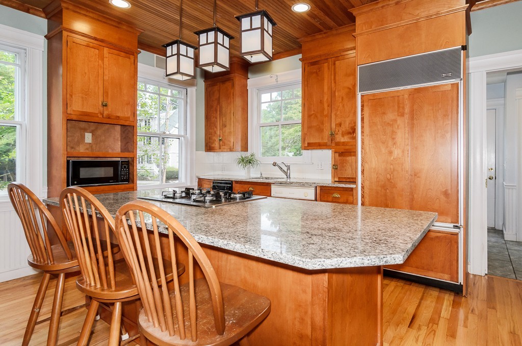 32 Dover Road Wellesley, MA 02482 - Photo 5 of 16 a view of kitchen island with furniture and windows