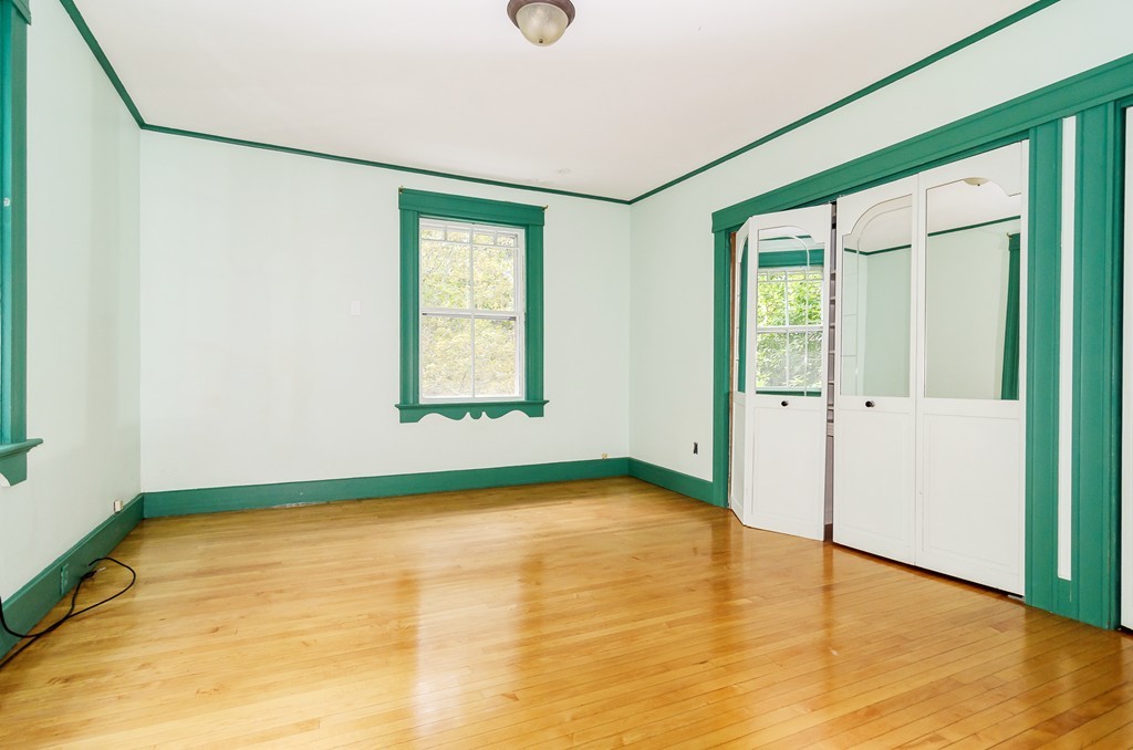 32 Dover Road Wellesley, MA 02482 - Photo 8 of 16 a view of an empty room with glass door