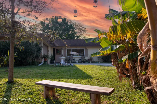 a house view with a garden space