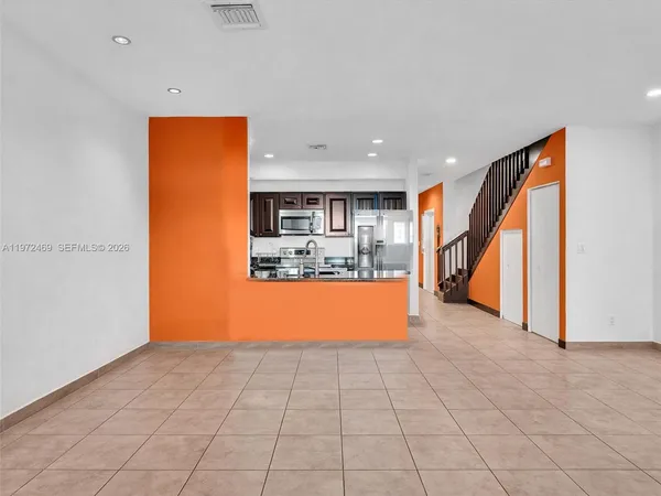 a view of kitchen and an entryway