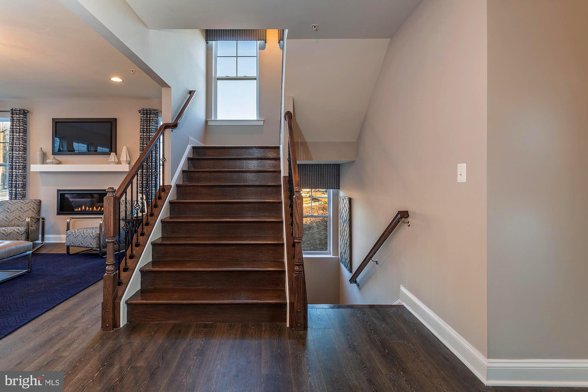 14617 Good Hope Road Silver Spring, MD 20905 - Photo 11 of 29 a view of entryway with wooden floor and stairs