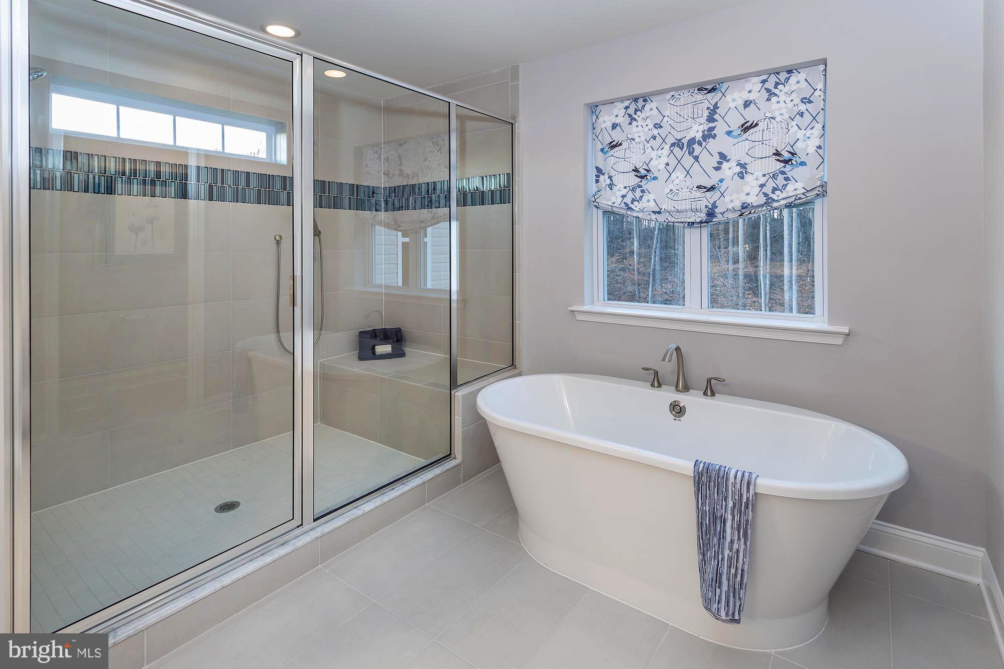14617 Good Hope Road Silver Spring, MD 20905 - Photo 13 of 29 a bathroom with a bathtub and shower
