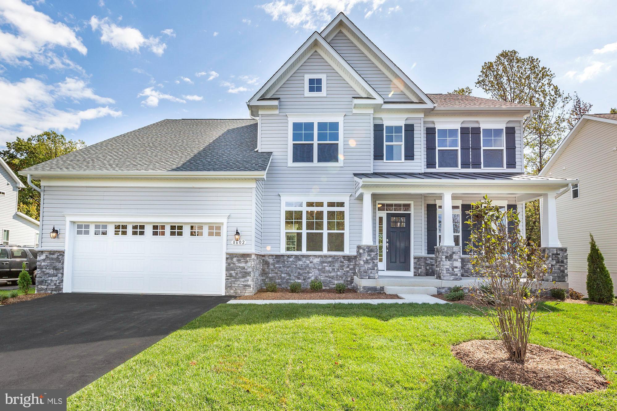 14617 Good Hope Road Silver Spring, MD 20905 - Photo 20 of 29 a front view of a house with garden
