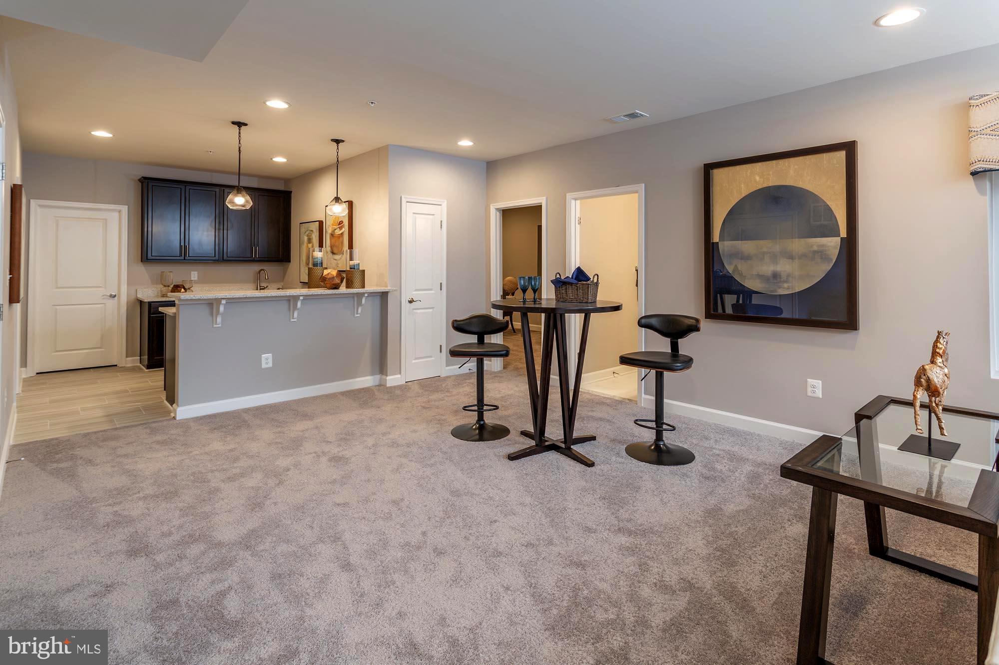 14617 Good Hope Road Silver Spring, MD 20905 - Photo 23 of 29 a view of a livingroom with furniture and a flat screen tv