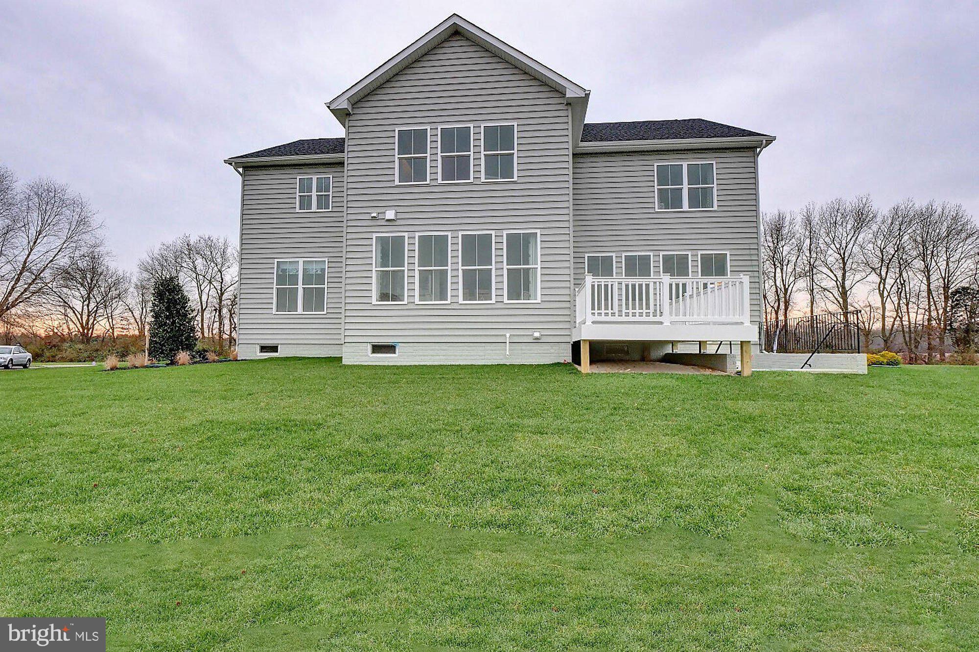14617 Good Hope Road Silver Spring, MD 20905 - Photo 28 of 29 a front view of a house with a yard
