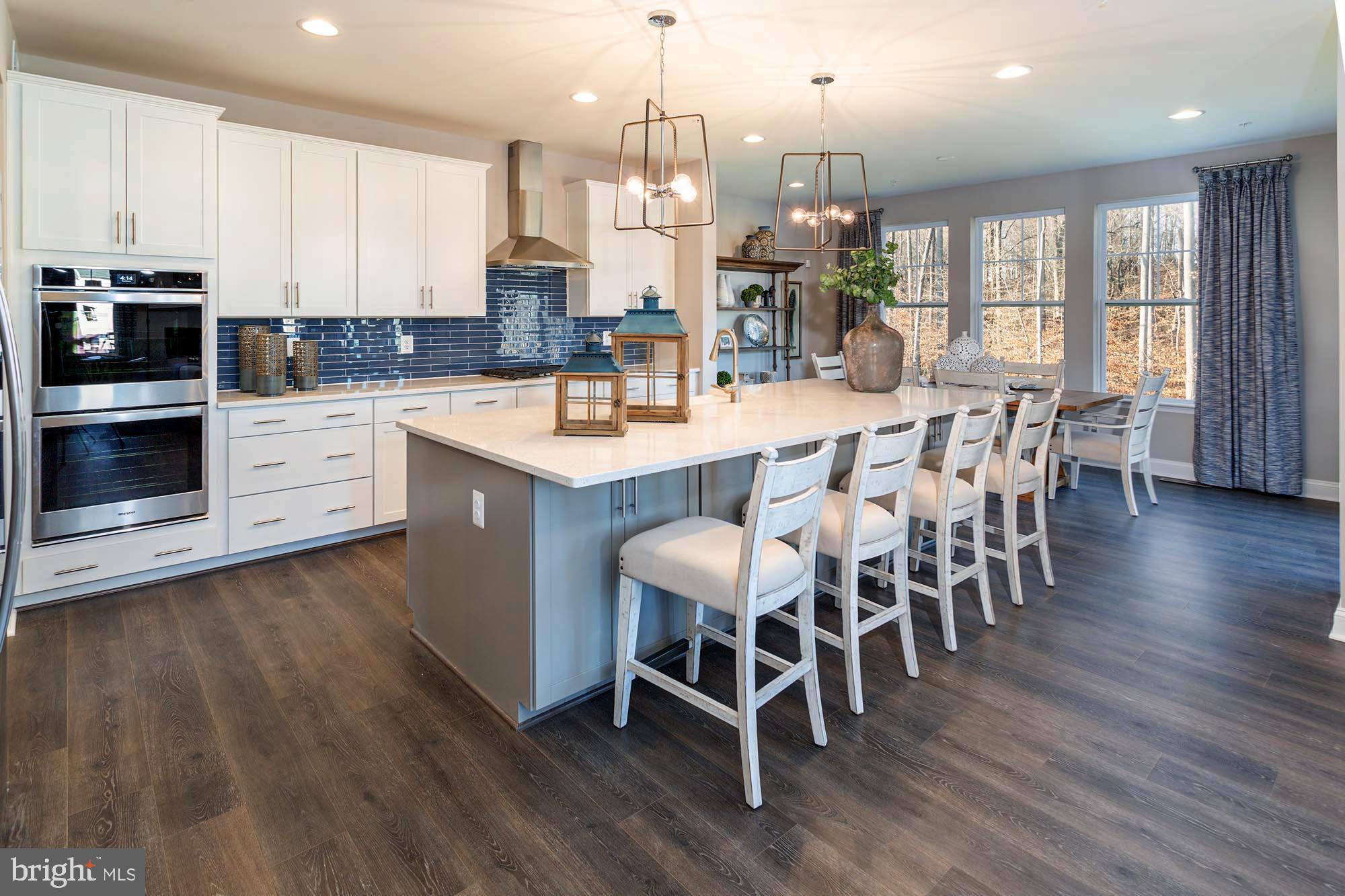 14617 Good Hope Road Silver Spring, MD 20905 - Photo 6 of 29 a large kitchen with a table and chairs