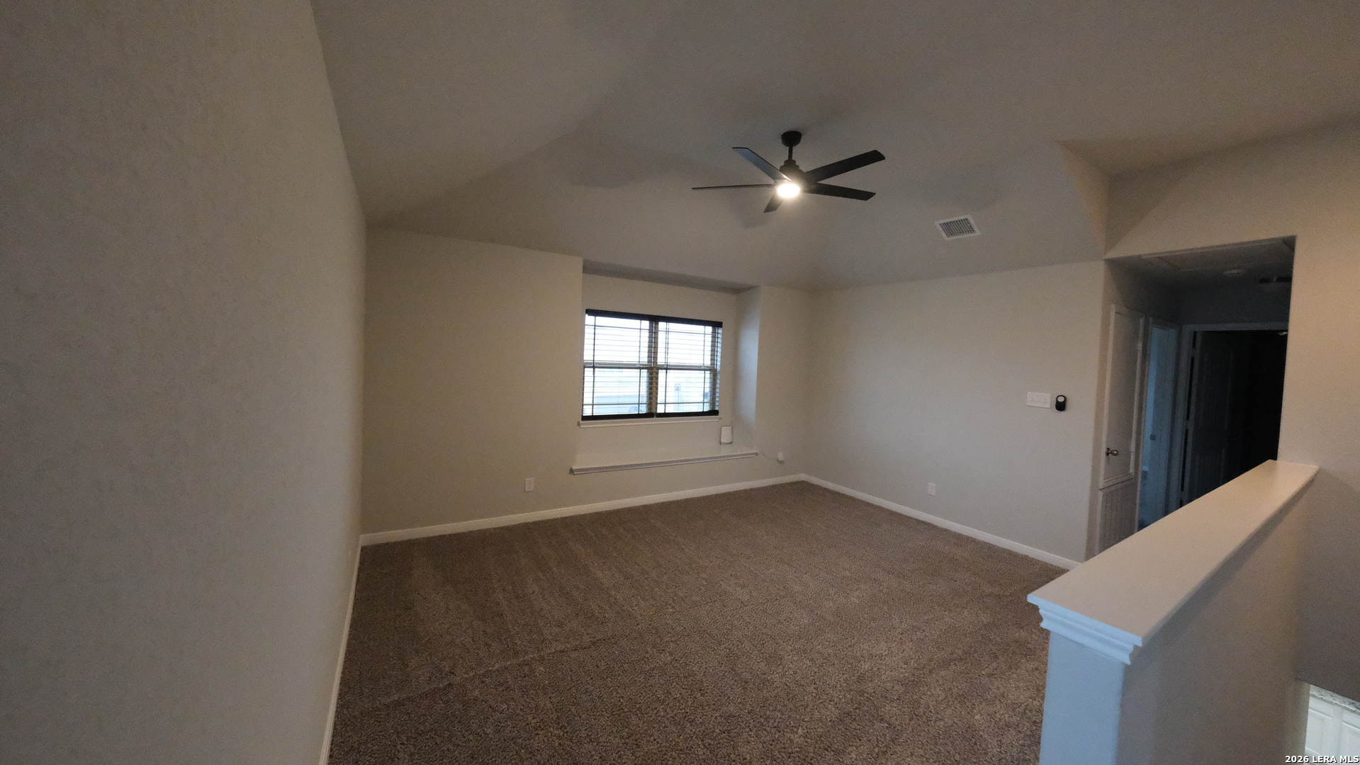 10335 Midsummer Converse, TX 78109 - Photo 12 of 24 a view of empty room with window