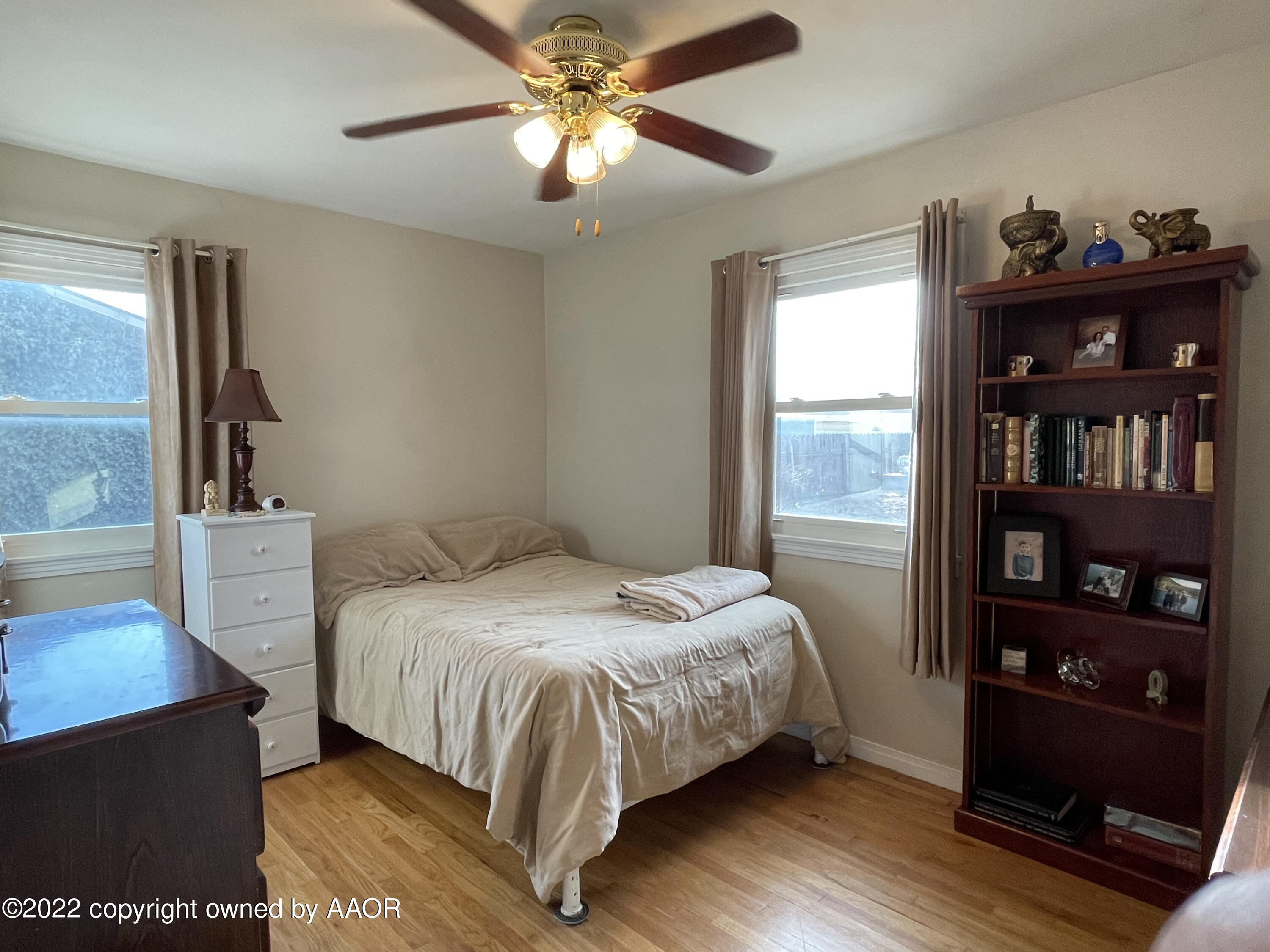 810 Ave Q Sunray, TX 79086 - Photo 11 of 29 a bedroom with a bed furniture and a window