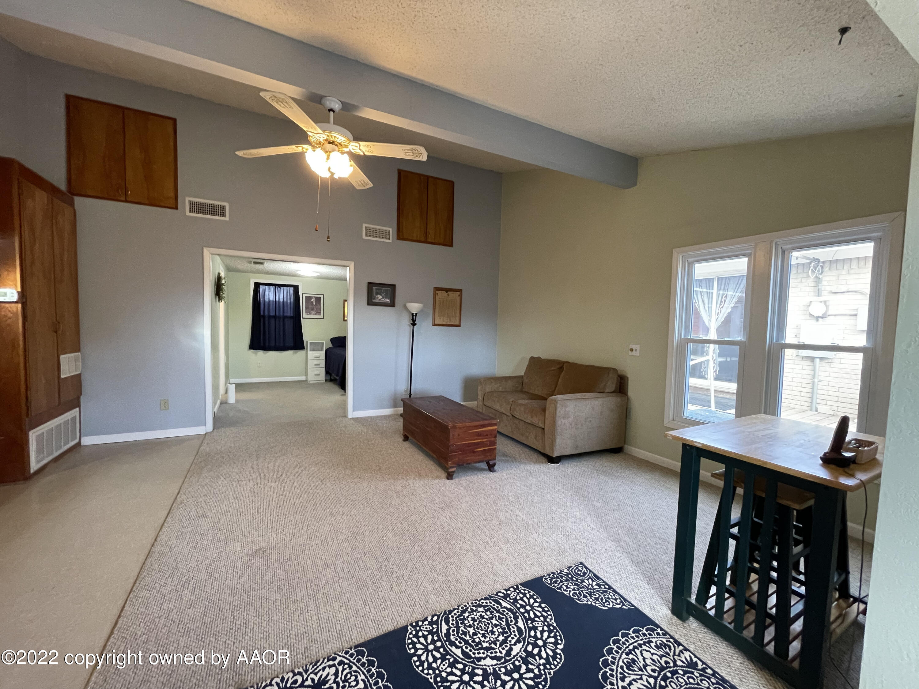 810 Ave Q Sunray, TX 79086 - Photo 28 of 29 a bedroom with furniture and a window