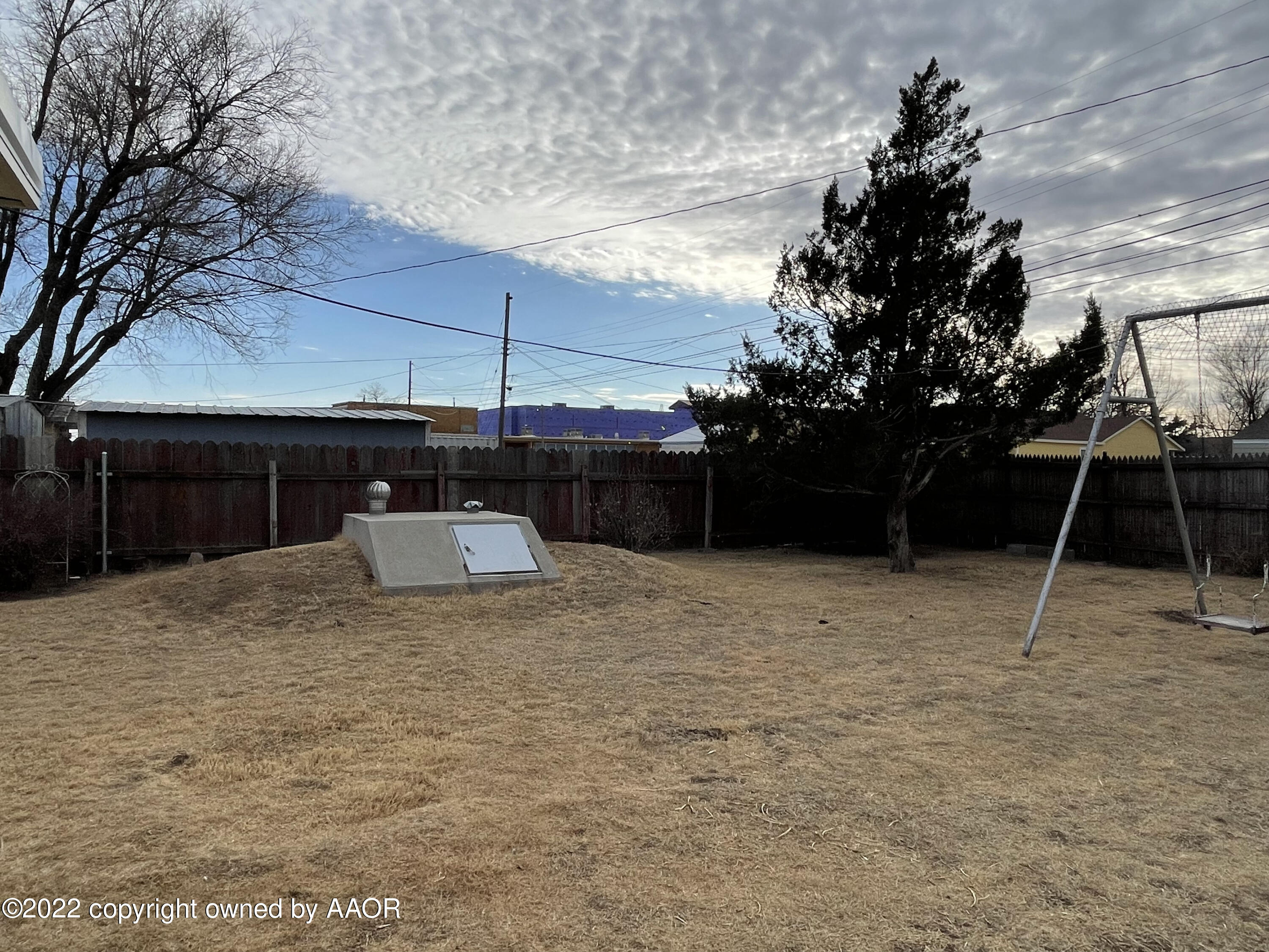 810 Ave Q Sunray, TX 79086 - Photo 26 of 29 a house view with a backyard space