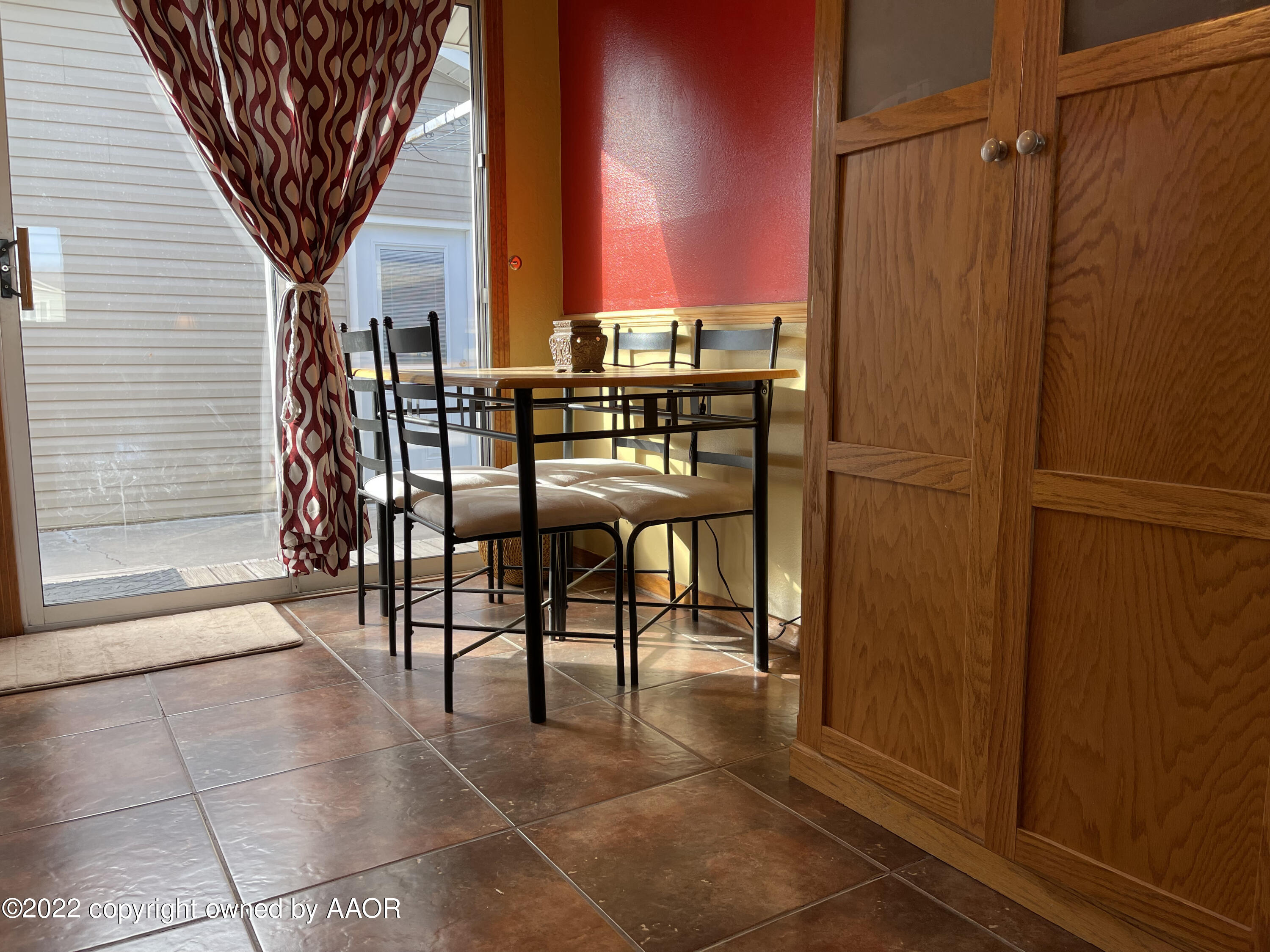 810 Ave Q Sunray, TX 79086 - Photo 7 of 29 a view of a porch with chairs and potted plants