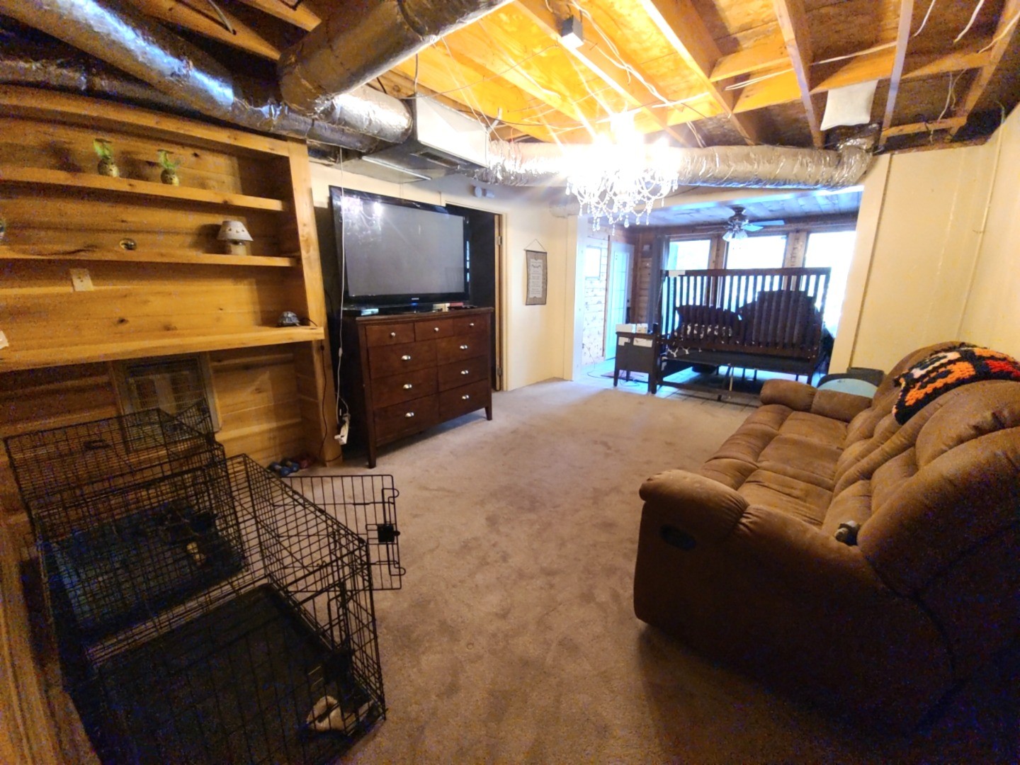 1360 Camden Bay Road Camden, TN 38320 - Photo 26 of 43 a living room with furniture a flat screen tv and outdoor view