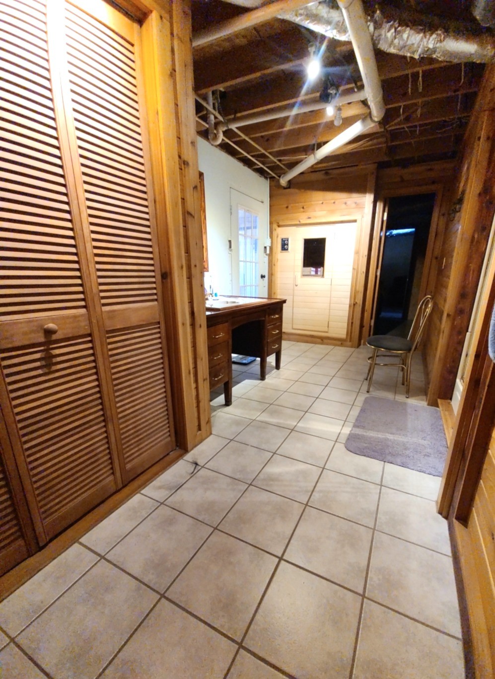 1360 Camden Bay Road Camden, TN 38320 - Photo 29 of 43 a view of a porch with wooden floor and a fire pit