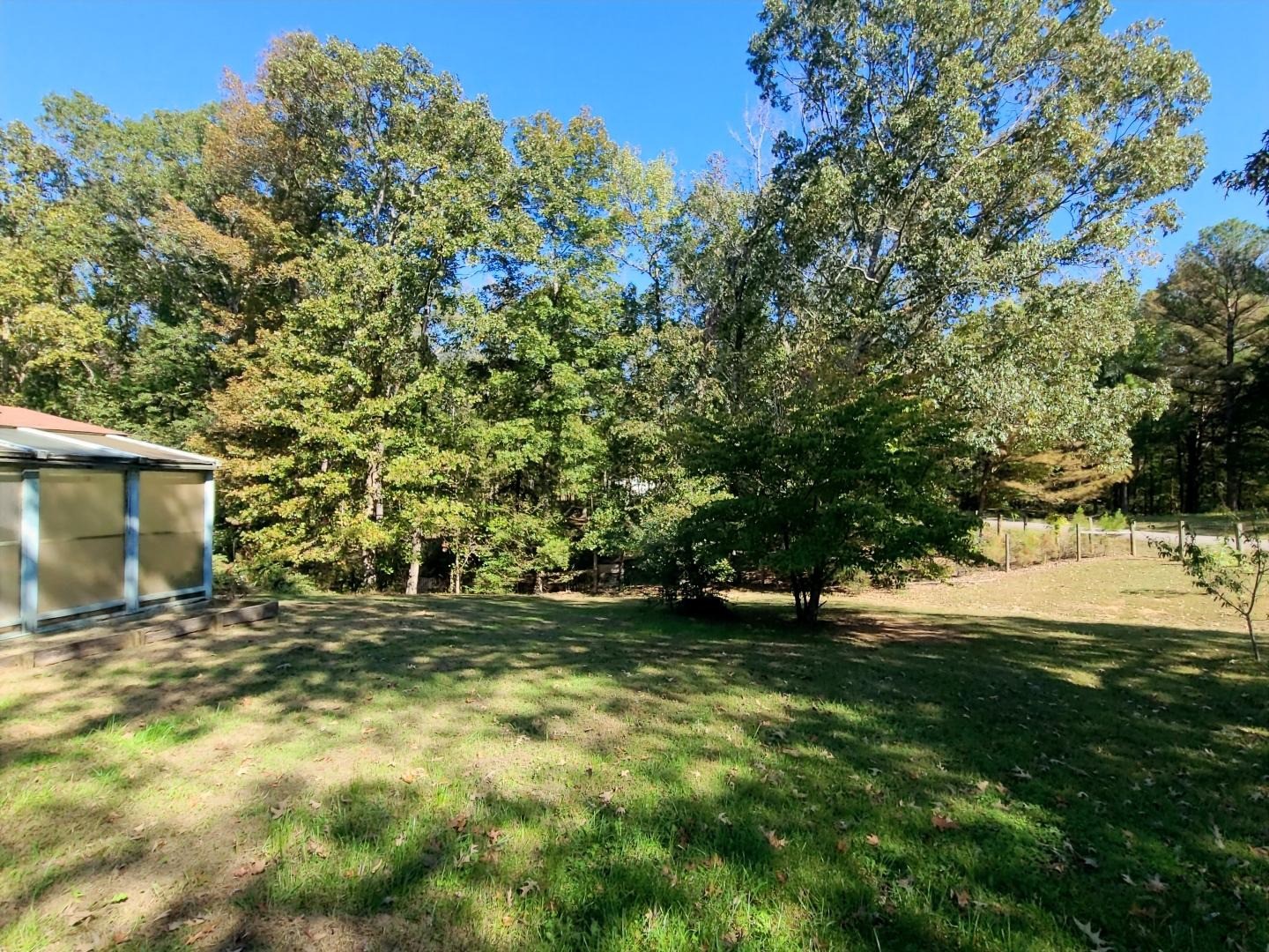 1360 Camden Bay Road Camden, TN 38320 - Photo 36 of 43 a view of outdoor space with deck and tree