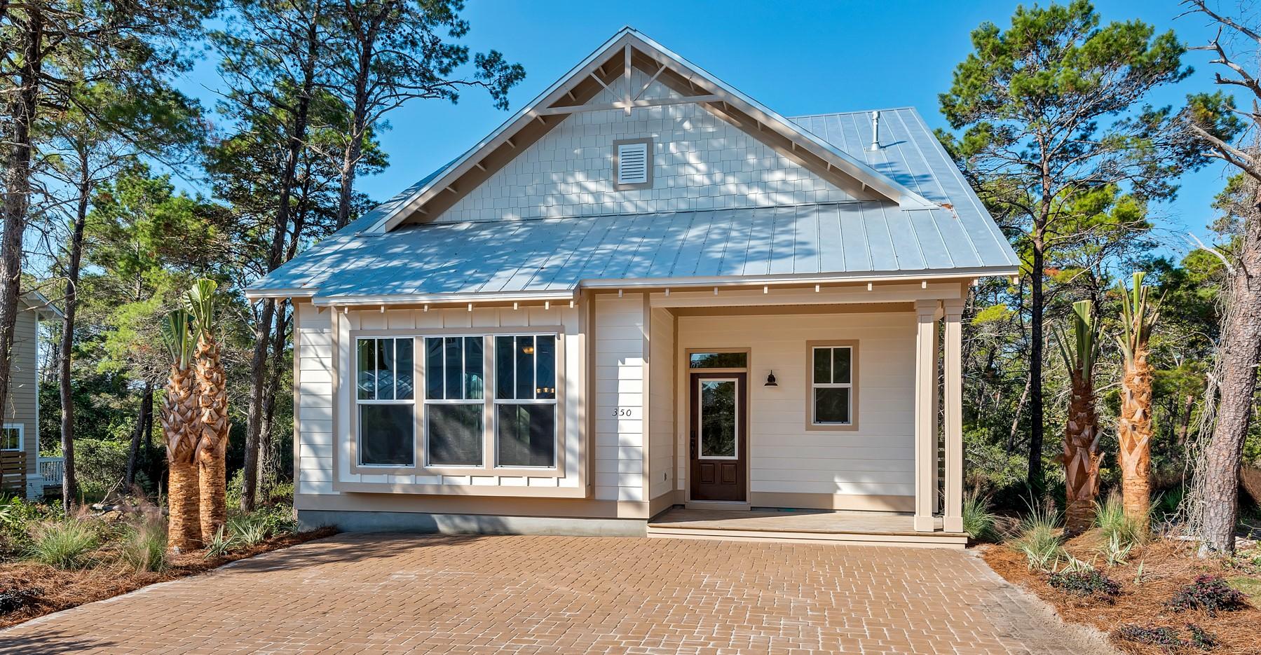 350 Grande Pointe Circle Inlet Beach, FL 32461 - Photo 1 of 21 a front view of a house with a garden