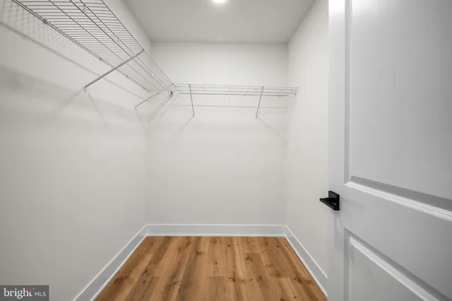 a view of a room with racks on the wall