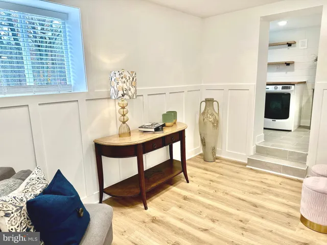 a view of living room with furniture and a window
