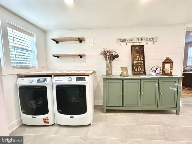 a utility room with a washer and dryer