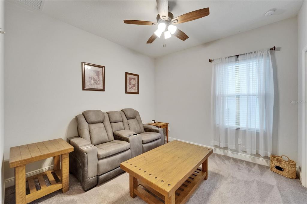 6127 Colmar Place Apollo Beach, FL 33572 - Photo 24 of 72 a living room with furniture and a window