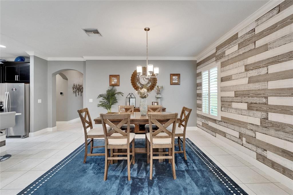 6127 Colmar Place Apollo Beach, FL 33572 - Photo 31 of 72 a view of a dining room with furniture window and outside view