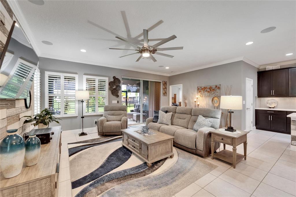6127 Colmar Place Apollo Beach, FL 33572 - Photo 33 of 72 a living room with furniture and a large window