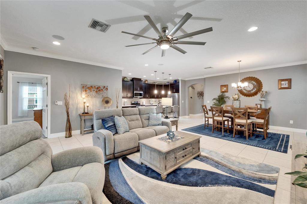 6127 Colmar Place Apollo Beach, FL 33572 - Photo 37 of 72 a living room with furniture and wooden floor