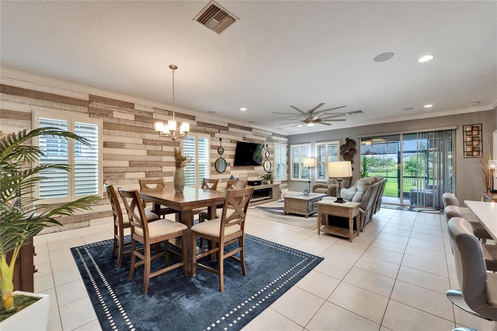 6127 Colmar Place Apollo Beach, FL 33572 - Photo 4 of 72 a view of a dining room with furniture window and outside view