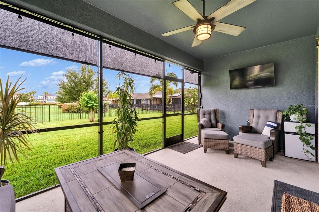 6127 Colmar Place Apollo Beach, FL 33572 - Photo 54 of 72 a living room with patio furniture and a yard