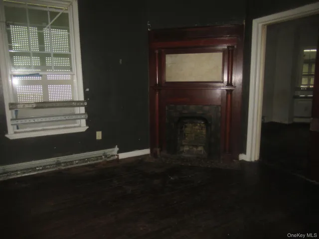 a living room with a fireplace