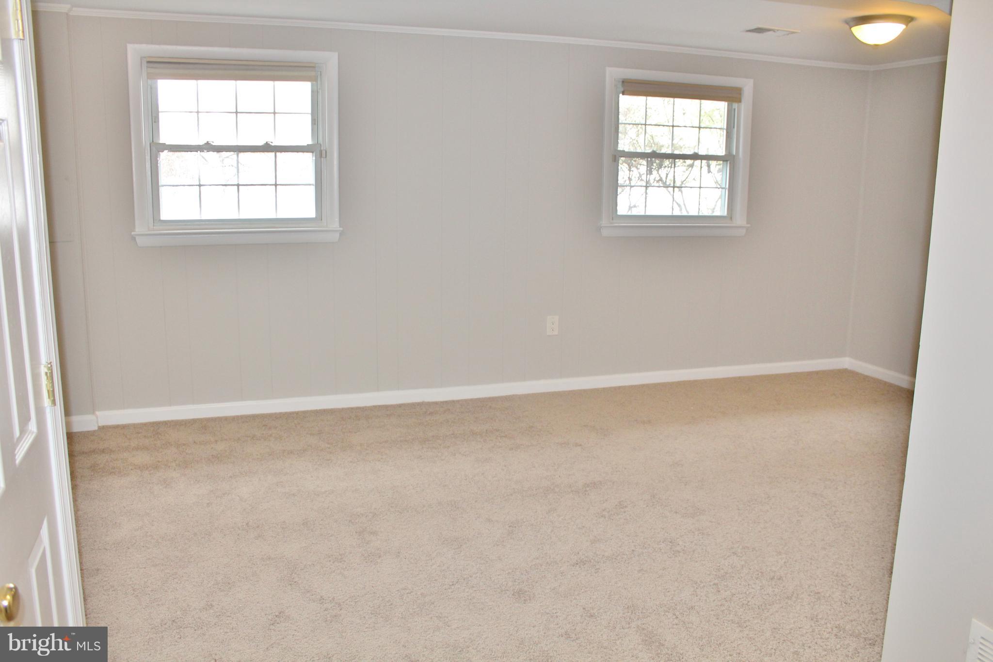8004 Frye Road Alexandria, VA 22309 - Photo 16 of 21 an empty room with a window