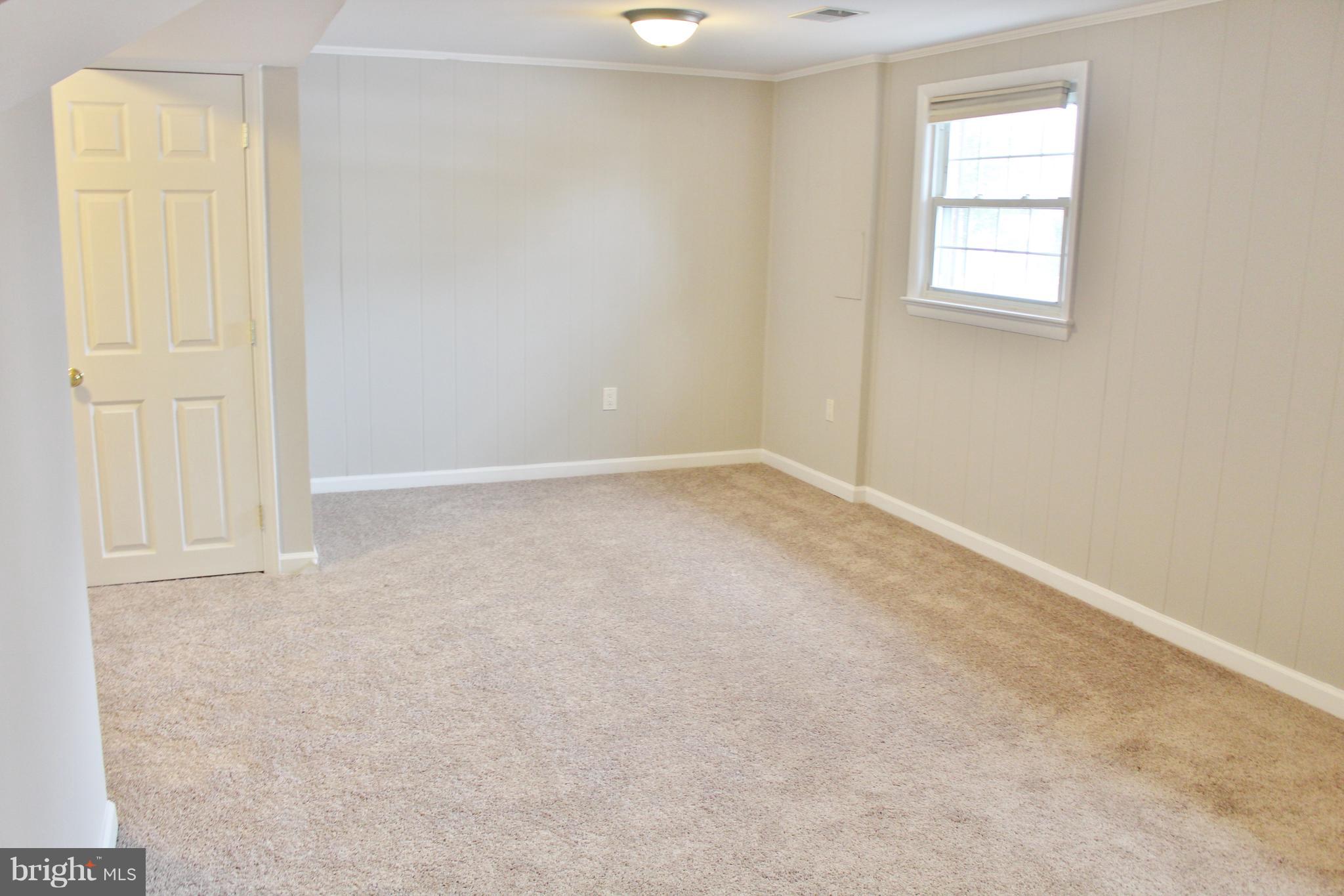 8004 Frye Road Alexandria, VA 22309 - Photo 17 of 21 an empty room with windows and closet